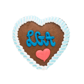 Ein Lebkuchenherz mit weißer Zuckerglasur am Rand liegt im Bildzentrum. In der Mitte befinden sich ein rotes Herz und ein Schriftzug aus blauer Zuckerschrift.