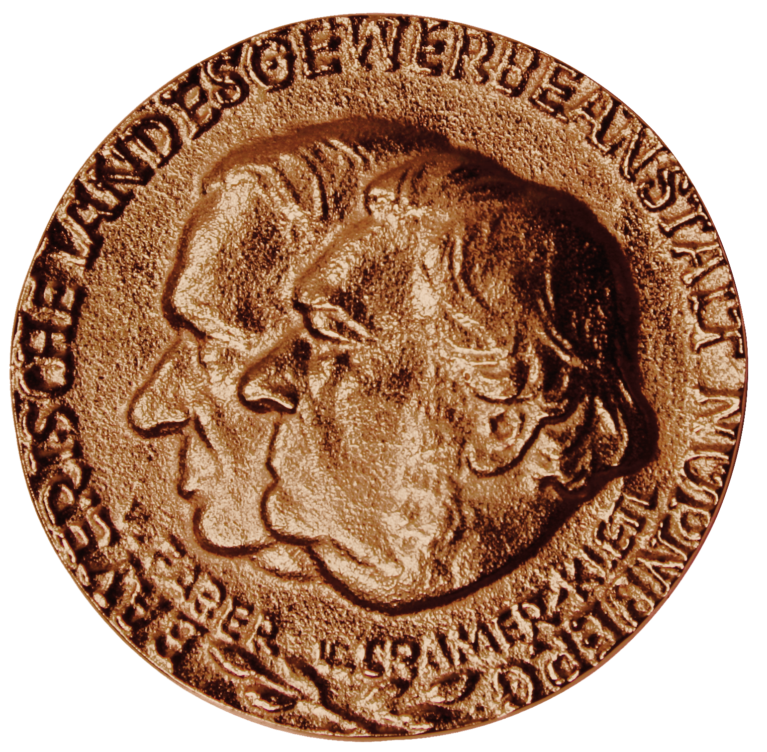 Das Bild zeigt eine bronzene Medaille mit den geprägten Profilen zweier Köpfe in der Mitte. Am Rand der Münze verläuft eine Inschrift in Großbuchstaben.