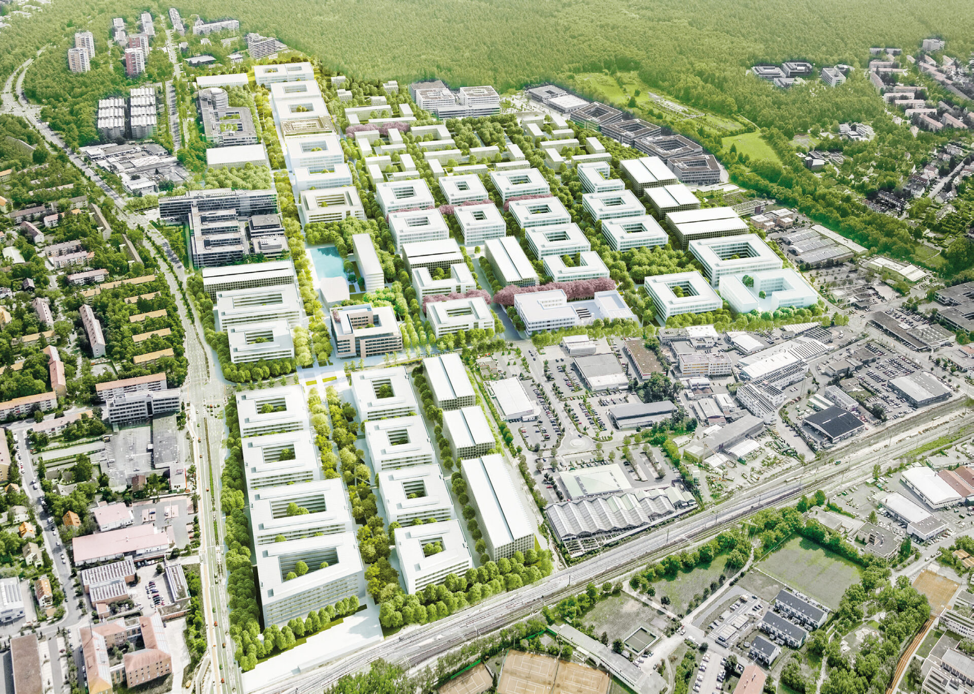 Das Bild zeigt eine Luftaufnahme eines großen städtischen Areals mit zahlreichen modernen, überwiegend weißen Gebäuden, die in einem rasterartigen Muster angeordnet sind. Zwischen den Gebäuden befinden sich Grünflächen mit Bäumen und Rasen, sowie Straßen, Wege und Parkplätze. Im Hintergrund sind weitere Bebauung und ein bewaldetes Gebiet zu erkennen.