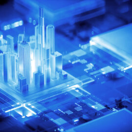 Das Bild zeigt eine futuristische Stadtlandschaft mit leuchtend blauen Hochhäusern in digitalem Stil. Die Gebäude stehen auf einer Fläche, die an eine Leiterplatte erinnert, wodurch sich Architektur und Technologie visuell verbinden. Die Darstellung betont eine moderne, technologisch geprägte Umgebung.